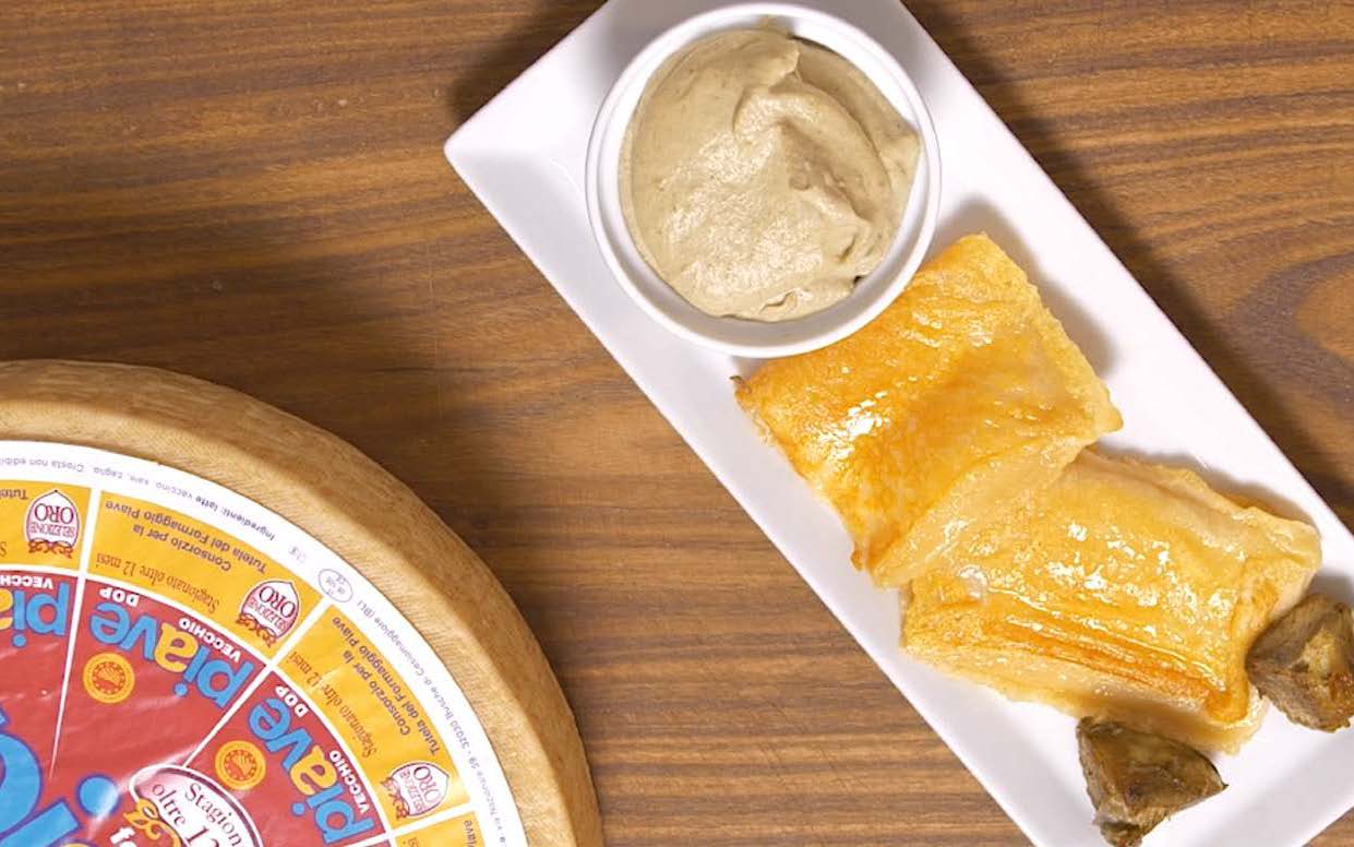 Formaggio alla griglia con crema di carciofi