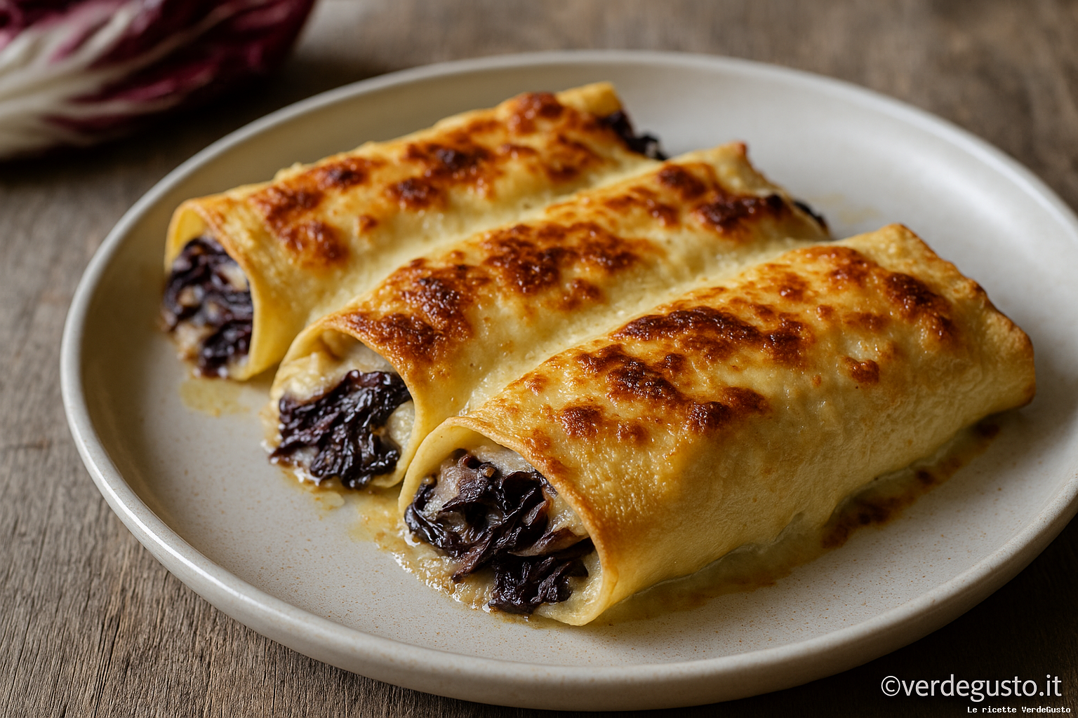 Ricetta Crespelle gratinate al radicchio e taleggio: ricetta con burro - Foto VGAI
